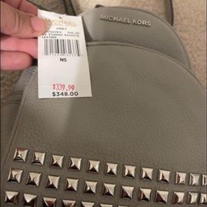 Brand new Michael Kors light grey leather mini backpack.